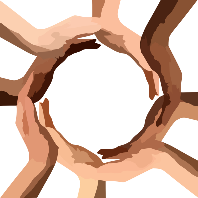 circle of hands of different skin colour